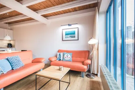 Wohnzimmer Haus Muschelsucher, Dünenstraße 44, App. 2