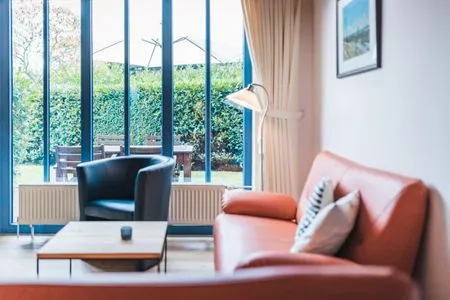 Wohnzimmer Haus Muschelsucher, Dünenstraße 44, App. 3