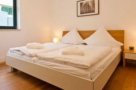 Schlafzimmer Villa Friede-Marie, App. Hannah - mit Terrasse und Ostseeblick