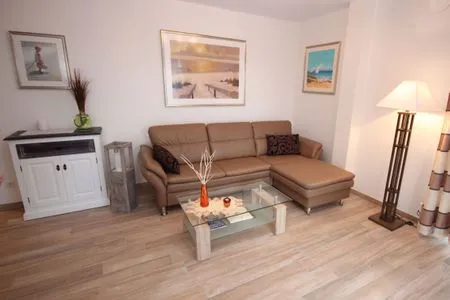 Wohnzimmer Villa Amelie, App. Seestern - mit Balkon und Meerblick