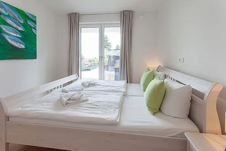 Schlafzimmer Villa Amelie, App. Baltic Sea - mit Meerblick