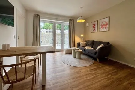 Gemütliches Wohnzimmer ideal für entspannende Abende. Salt & Sand Haffkrug Salt & Sand Wohnung Sand