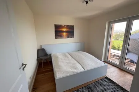 Schlafzimmer Ferienwohnung Frees Mooi