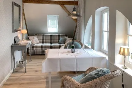 Wohnzimmer Villa Imme App. 5 - großzügige Studio-Ferienwohnung mit Südbalkon & Meerluft-Feeling