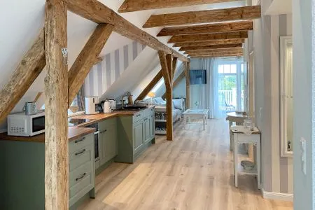 Wohnzimmer Villa Imme App. 5 - großzügige Studio-Ferienwohnung mit Südbalkon & Meerluft-Feeling