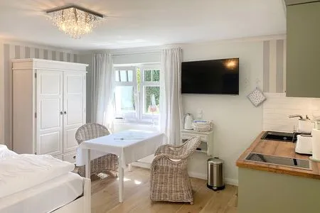 Wohnzimmer Villa Imme App. 6 - Perfekt für Paare: gemütlicher Rückzugsort mit Gartenblick