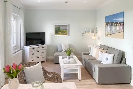 Wohnzimmer Haus Anholt App. 36 - Auszeit zu Zweit mit Strandkorb auf dem Balkon