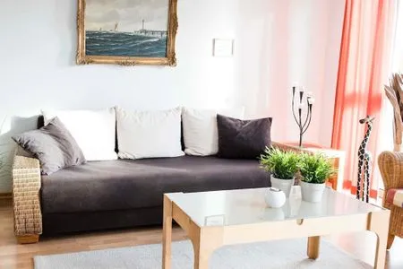 Wohnzimmer Haus Victoria, App. Sonnendeck - mit Meerblick