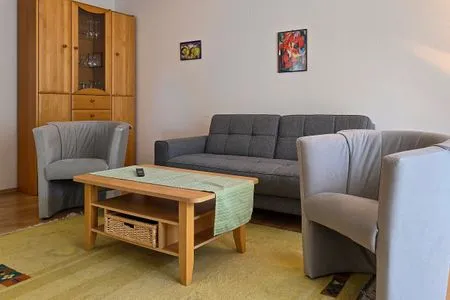 Wohnzimmer Ferienwohnung Feuerstein - in Hafennähe