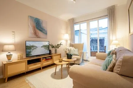 Wohnzimmer (ARW3) Ferienwohnung Cozy Harbour