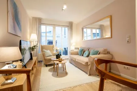 Wohnzimmer (ARW3) Ferienwohnung Cozy Harbour