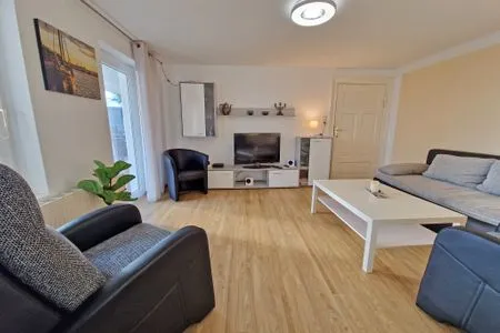 Wohnzimmer Ferienwohnung Ostseeheim - 1. Reihe mit Meerblick