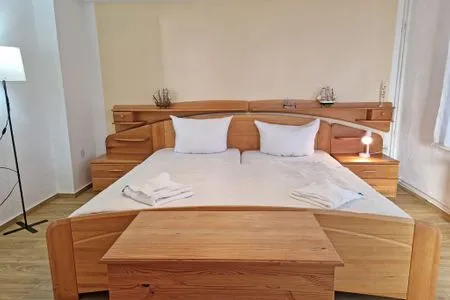 Bett Ferienwohnung Ostseeheim - 1. Reihe mit Meerblick