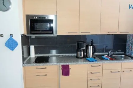 Küche / Küchenzeile Holiday Residenz I Ferienwohnung Inselheimat B42