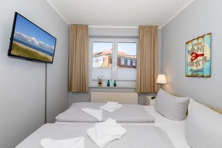 Schlafzimmer Apartmenthaus Eichsfeldia Ferienwohnung 9