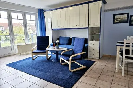Wohnzimmer Ferienwohnung am Salzhaff C6