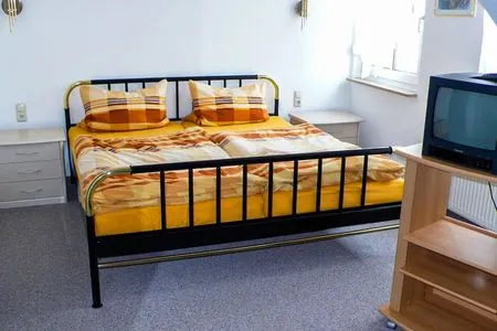 Schlafzimmer Ferienwohnung Nest am Meer