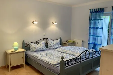 Schlafzimmer Villa Laura Cottage Ferienwohnung 103