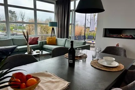  Marina Strandbad Chalet Wasserwelt mit Zaun Haus Nr. 32