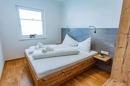 Schlafzimmer 1, Doppelbett Happy Aich 3 by Alpenidyll Apartments