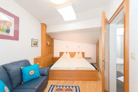 Schlafzimmer 2, Doppelbett City Life 1 by Alpenidyll Apartments