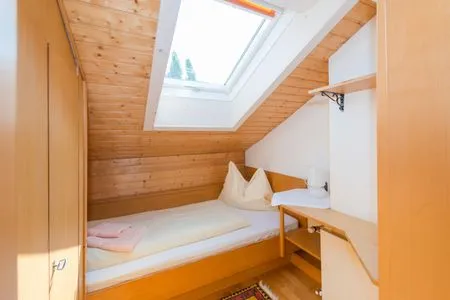 Schlafzimmer 2, Einzelbett City Life 3 by Alpenidyll Apartments
