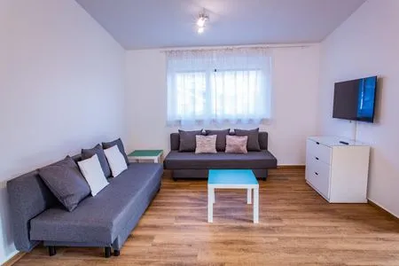 Schlafsofa, Fernseher City Dream 1 by Alpenidyll Apartments