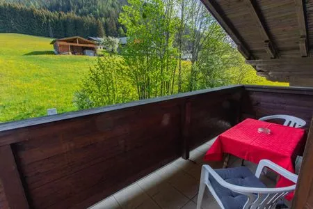Balcony with a view of the mountains Huberhof 8 by Alpenidyll Apartments