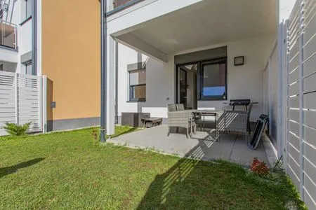 Terrace with seating and a view of the mountains Sunny Aich by Alpenidyll Apartments