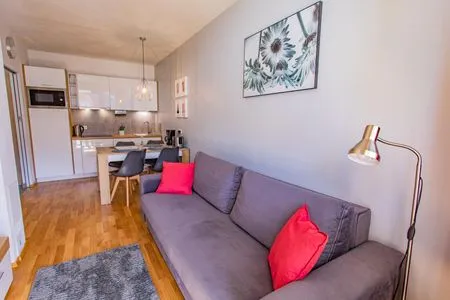 Living room and dining area Sunny Aich by Alpenidyll Apartments
