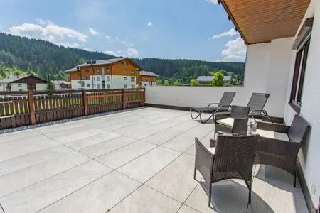 Terrasse mit Blick Schisprungschanze Bergidyll 4 by Alpenidyll Apartments