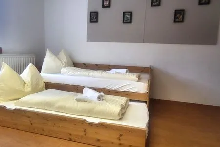 Schlafzimmer Hoamathaus II by Alpenidyll Apartments