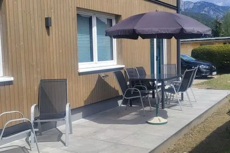 Outdoor area with seating Lasserhäusl by Alpenidyll Apartments