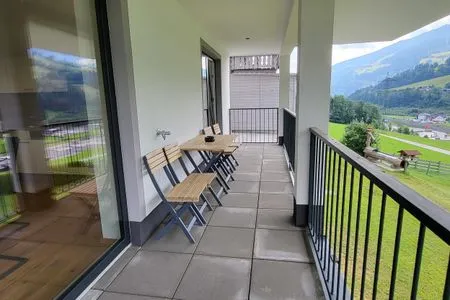Balcony with a view of the mountains Fischbacher App. 1 by Alpenidyll Apartments