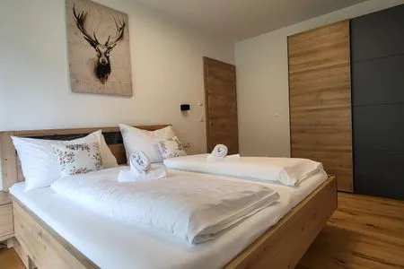 Bedroom 1, double bed Fischbacher App. 1 by Alpenidyll Apartments
