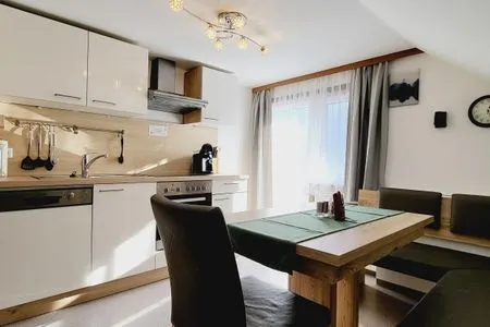 Kitchen island and dining area Fischbacher App. 3 by Alpenidyll Apartments