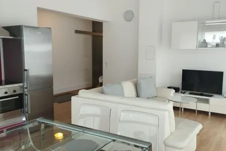 Wohnlandschaft mit Fernseher Bergblick by Alpenidyll Apartments