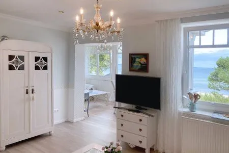 Wohnzimmer Villa Hansa App. A2 - perfekter Blick über die Dünen auf die Lübecker Bucht