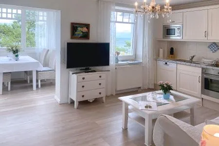 Wohnzimmer Villa Hansa App. A2 - perfekter Blick über die Dünen auf die Lübecker Bucht