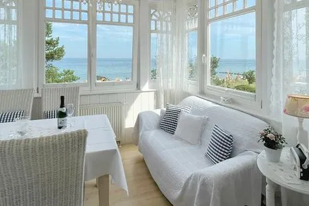 Wohnzimmer Villa Hansa App. B2 - wunderbarer Meerblick im Wintergarten