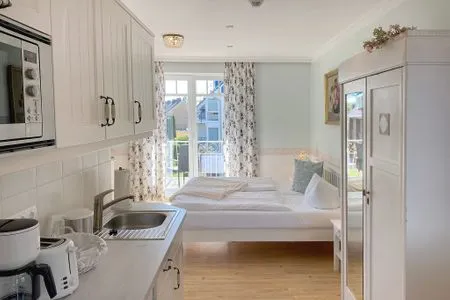 Wohnzimmer Villa Hansa App. C2 - strandnahes Studio mit Südbalkon & Seeblick