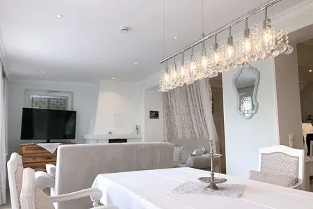 Wohnzimmer Unser Sommerhaus - Ferienhaus mit Garten, Balkonen & Sonnenterrasse