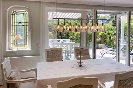 Wohnzimmer Unser Sommerhaus - Ferienhaus mit Garten, Balkonen & Sonnenterrasse