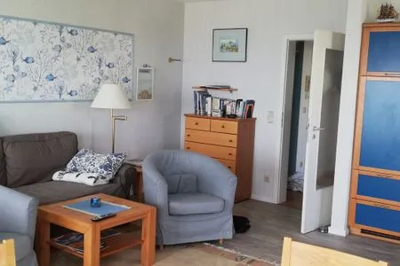 Wohnzimmer Ferienwohnung Kapitänsmesse -  traumhafter Ausblick über Hafen und Meer