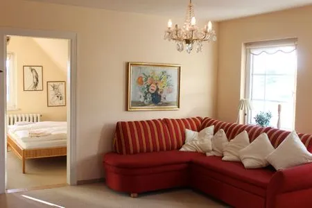 Wohnzimmer Ferienwohnung Rundumblick - zentral in der Hafenstadt Sassnitz