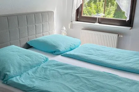 Schlafzimmer Ferienwohnung Stockrose - ganz nah am Nationalpark Jasmund