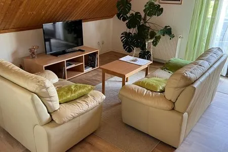 Wohnzimmer Ferienwohnung Stockrose - ganz nah am Nationalpark Jasmund