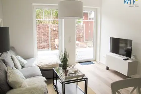 Wohnzimmer Ferienhaus Melkerpad 28 Ferienwohnung Langeoogzeit