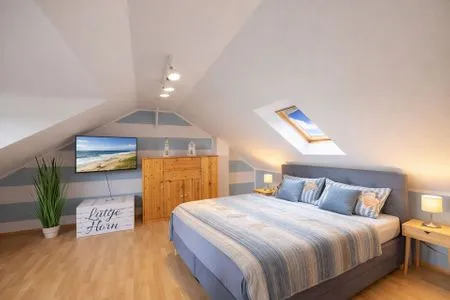Schlafzimmer Haus Lüttje Hörn Apartment Meer