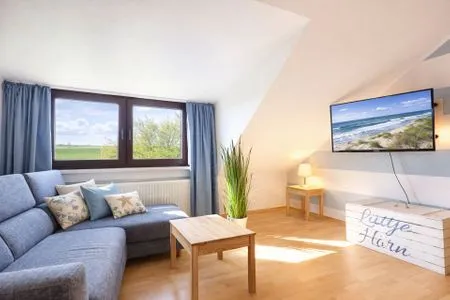 Wohnzimmer Haus Lüttje Hörn Apartment Meer